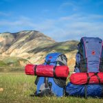 Camping backpack in a field